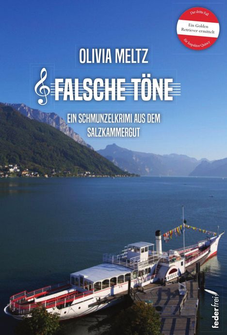 OLIVIA MELTZ, FALSCHE TÖNE, EIN SCHMUNZELKRIMI AUS DEM SALZKAMMERGUT. Ein Schiff an einem Steg vor Bergen und See.