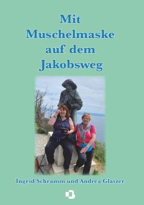"Mit Muschelmaske auf dem Jakobsweg" oben, "Ingrid Schramm und Andrea Glatzer" unten; zwei Personen lächelnd vor einer Statue.