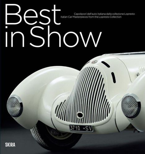 "Best in Show" steht groß im oberen Bereich. Darunter ein eleganter, cremefarbener Oldtimer mit markantem Kühlergrill.