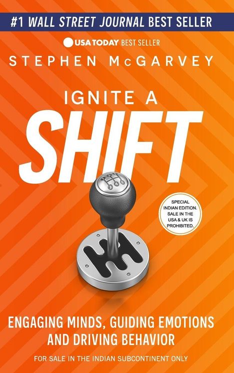#1 Wall Street Journal Bestseller. „Ignite a Shift“ von Stephen McGarvey. Schaltknauf vor orangefarbenem Hintergrund.