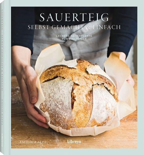 "Sauerteig: Selbst gemacht & einfach. Leckere Brotrezepte für Einsteiger." Zwei Hände halten einen Brotlaib.