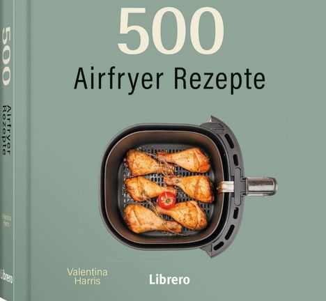 "500 Airfryer Rezepte" von Valentina Harris, Libro. Bild: Fünf Hähnchenschenkel und eine Kirschtomate im Airfryer.