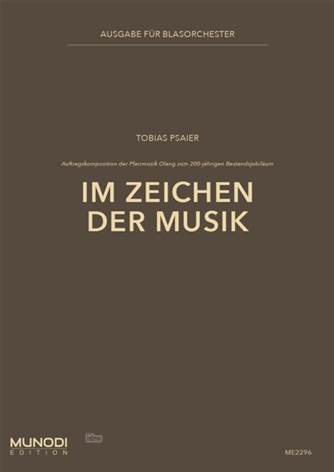 „Im Zeichen der Musik“ von Tobias Psaier, Auftragskomposition der Pfarrmusik Olang. Ausgabe für Blasorchester, schlichtes Design.