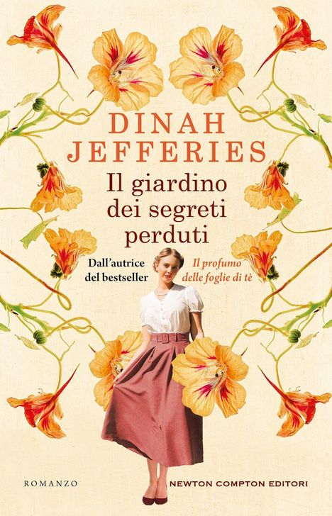 Text: "DINAH JEFFERIES, Il giardino dei segreti perduti, Dall'autrice del bestseller Il profumo delle foglie di tè."

Große Blumen und eine Frau in einem klassischen Outfit.
