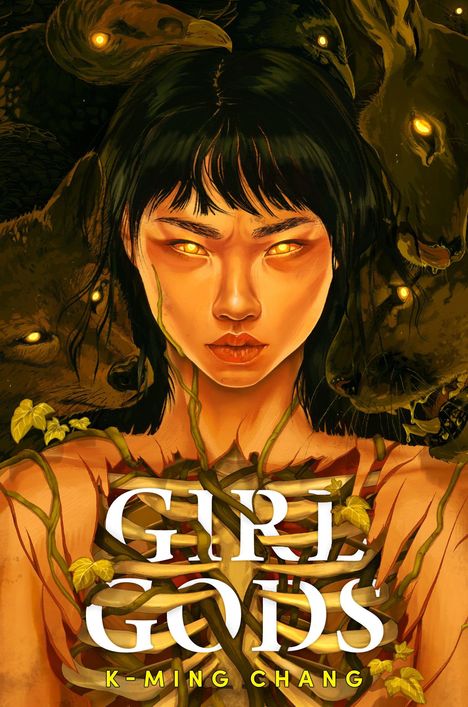 Text: "GIRL GODS" und "K-MING CHANG". Eine Illustration zeigt eine Frau mit leuchtenden Augen und Tieren im Hintergrund.