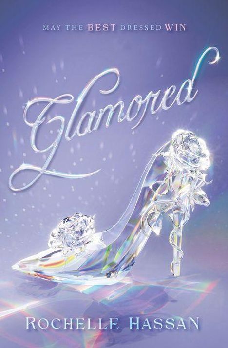 Text: "May the Best Dressed Win", "Glamored", "Rochelle Hassan". Kristallschuh in Regenbogenfarben, funkelnde Dekorationen.