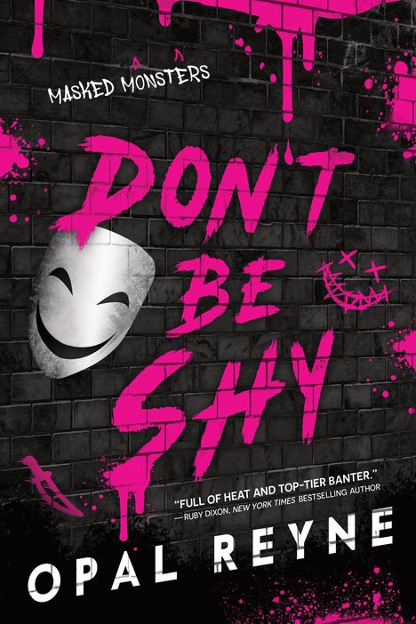 "MONSTERS ARE SCARY SEXY" und "DON'T BE SHY" in rosa Schrift auf schwarzer Ziegelwand. Weiße Maske und Grinsegesicht.