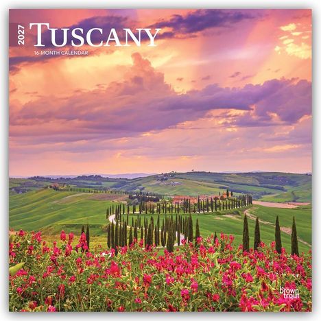 2027 Tuscany Kalender mit 16 Monaten. Hügelige Landschaft in der Dämmerung, Zypressenallee, rote Blumen im Vordergrund.