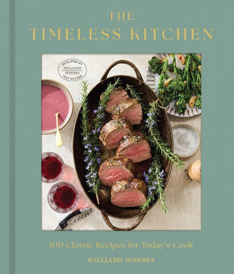 "The Timeless Kitchen: 100 Classic Recipes for Today’s Cook. Ein Braten mit Kräutern auf einem Tisch mit Beilagen."