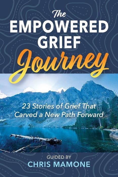 „The Empowered Grief Journey: 23 Stories...“ Ein Bergsee mit Bergen im Hintergrund.
