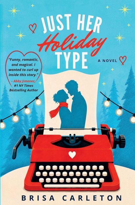 „JUST HER Holiday TYPE“, eine rote Schreibmaschine, Paarsilhouette, Lichterkette, Winterlandschaft.