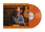 "Jerry Jeff Walker" und "Navajo Rug". Ein Mann mit Cowboyhut, Gitarre im Hintergrund, orangefarbene Schallplatte.