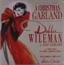 Text: "A Christmas Garland, Debbie Wileman, as Judy Garland". Illustration: Frau in rotem Kleid mit schwarzen Handschuhen.