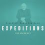 "Frankfurt Radio Big Band, EXPEDITIONS, JIM McNEELY" erscheint über einem unscharfen Bild eines sitzenden Mannes in Anzug.