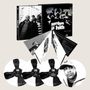 Text: "stakes is high", "de la soul". Ein schwarz-weißes Album-Set mit mehreren Schallplatten und Fotos.