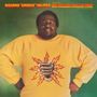 Oben steht: "RICHARD 'GROOVE' HOLMES SIX MILLION DOLLAR MAN". Ein Mann in gelbem Pullover mit Blitz-Design in der Mitte.