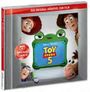 "Das Original-Hörspiel zum Film", "Toy Story 5", "mit den Original-Stimmen". Figuren aus Toy Story schauen aus einem Rahmen.