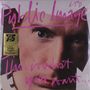 „Public Image Ltd. This is what you want...“ in pinker Schrift auf einem Gesicht mit einem intensiven Blick.
