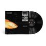Schwarze Schallplatte mit Cover „BREATHE x30“, zeigt einen goldenen Fisch auf dunklem Hintergrund.