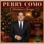 "Perry Como Greatest Christmas Songs" enthält eine Liste von Liedern. Ein Mann im Anzug vor einem festlich dekorierten Raum.