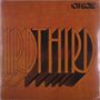 Oben rechts steht "Soft Machine". In der Mitte: "Third" in großen, orangefarbenen Buchstaben mit 3D-Effekt.