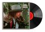 Text: "BOB DYLAN DESIRE". Cover zeigt einen Mann mit Hut und Pelzmantel. Rechts eine schwarze Vinyl-Schallplatte.