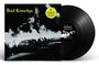„Dead Kennedys“ in gelber Schrift. Schwarz-weißes Cover zeigt brennendes Auto. Eine Vinyl-Schallplatte daneben.