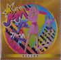 Logo mit "Jem" und "and the holograms!" in bunten Farben, darunter "DELUXE". Vier Figuren mit Instrumenten.