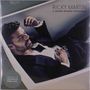 Text: "RICKY MARTIN, A QUIEN QUIERA ESCUCHAR, PRESSED ON COKE BOTTLE GREEN VINYL". Ein Mann im Anzug liegt entspannt.