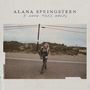 Texte: ALANA SPRINGSTEEN, I HOPE THIS HELPS. Eine Frau geht allein auf einer Straße. Im Hintergrund sind Stromleitungen.