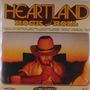 "HEARTLAND ROCK and ROLL" in großen Buchstaben. Eine Person mit Hut zündet sich eine Zigarette an, im Hintergrund ein Sonnenuntergang.