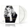 "CÉLINE DION - ENCORE UN SOIR" steht auf einem Schwarz-Weiß-Foto der Sängerin, die sanft lächelnd posiert.