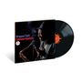 Cover mit Text "Wrapped Tight Coleman Hawkins". Ein Mann mit Anzug spielt Saxophon, daneben eine schwarze Schallplatte.