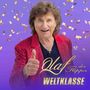 „Olaf der Flipper WELTKLASSE“ steht auf lila Hintergrund mit goldenen Konfetti. Ein Mann zeigt den Daumen hoch.