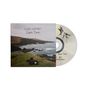Text: "Lukas Graham Good Times". CD-Cover mit Küstenlandschaft, liegende Person auf Wiese, daneben CD mit Vogelillustration.