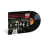 Auf einem Albumcover steht "TOM PETTY AND THE HEARTBREAKERS NO SLEEP TIL L.A." mit einem Schwarz-Weiß-Foto der Band.