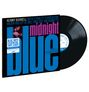 "KENNY BURRELL...MIDNIGHT BLUE" in großen Buchstaben, mit Vinyl-Schallplatte und einem kleinen Musikerfoto.