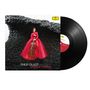 "Philip Glass for Cello", "Camille Thomas". Frau in rotem Kleid vor abstrakter, schwarzer Struktur, hält ein Cello. Vinyl-Schallplatte.