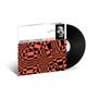 "Dimensions & Extensions + Sam Rivers." Schwarz-weißes Foto oben rechts. Abstrakte orange-schwarze Muster unten. Vinyl-Schallplatte.