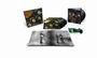 "Rubber Soul", "PARLOPHONE". Album-Cover mit vier Personen, Schallplatten und ein offenes Buch mit einer Schwarzweißfotografie.
