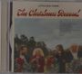 CD-Cover "The Christmas Record" von Little Big Town. Vier Menschen mit Kränzen auf einem Feld.