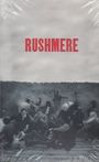 "RUSHMERE" in roter Schrift oben; darunter eine unscharfe Szene mit Menschen auf einer Plattform; eine Gitarre ist erkennbar.