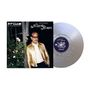 Text: "Still Blooming: Night Blooms, Jeff Goldblum and The Mildred Snitzer Orchestra." Ein Mann in goldener Jacke, Blumen.