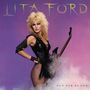 "LITA FORD" und "OUT FOR BLOOD". Frau mit blonden Haaren in Lederoutfit, hält E-Gitarre, Hintergrund in Lila.