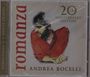 "Romanza", "20th Anniversary Edition", "Andrea Bocelli". Illustration: Mann im roten Pullover, nachdenklich an Tisch.