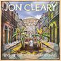 „Jon Cleary Live at the Royal Albert Hall.“ Eine bunte Illustration zeigt eine Straße mit einem Pianisten zwischen Palmen.