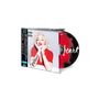 CD-Hülle mit japanischem Text und einem "Rebel Heart" Schriftzug. Frau in rotem Oberteil lächelt, CD mit Kunstmotiv.