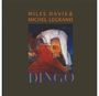 Text: "MILES DAVIS & MICHEL LEGRAND", "DINGO". Illustration: Musiker mit einer Trompete in einer dynamischen Pose.