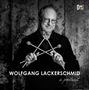 "Wolfgang Lackerschmid, a portrait", zeigt einen Mann mit Brille und Bart, der vier Schlägel kreuzt. Logo oben rechts.