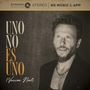 UNO NO ES UNO (Versión Noel). Oben sind Logos von Dynamo Productions und NS Music; rechts ein Mann mit Bart.